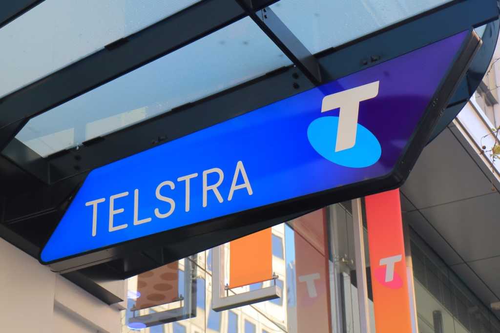 A sign for a Telstra shop.