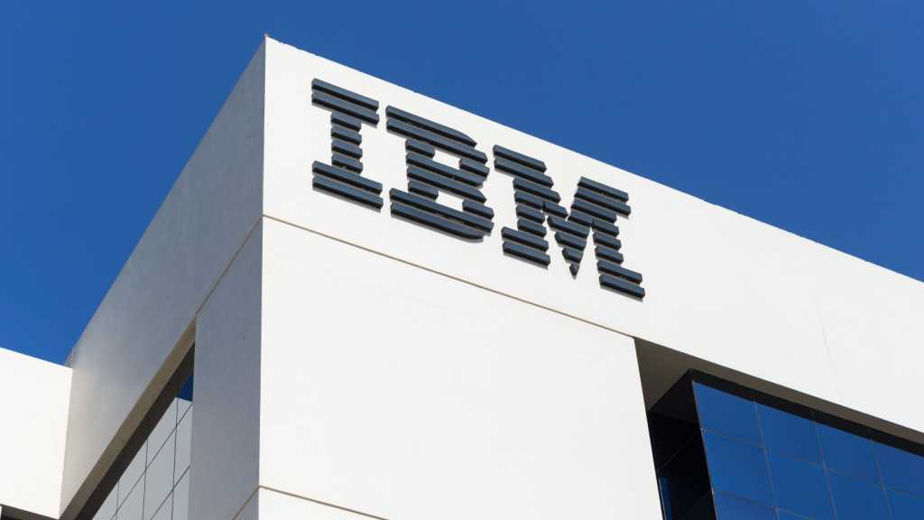 A photograph of a building with the IBM logo on one side.